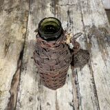 Green wicker bottle