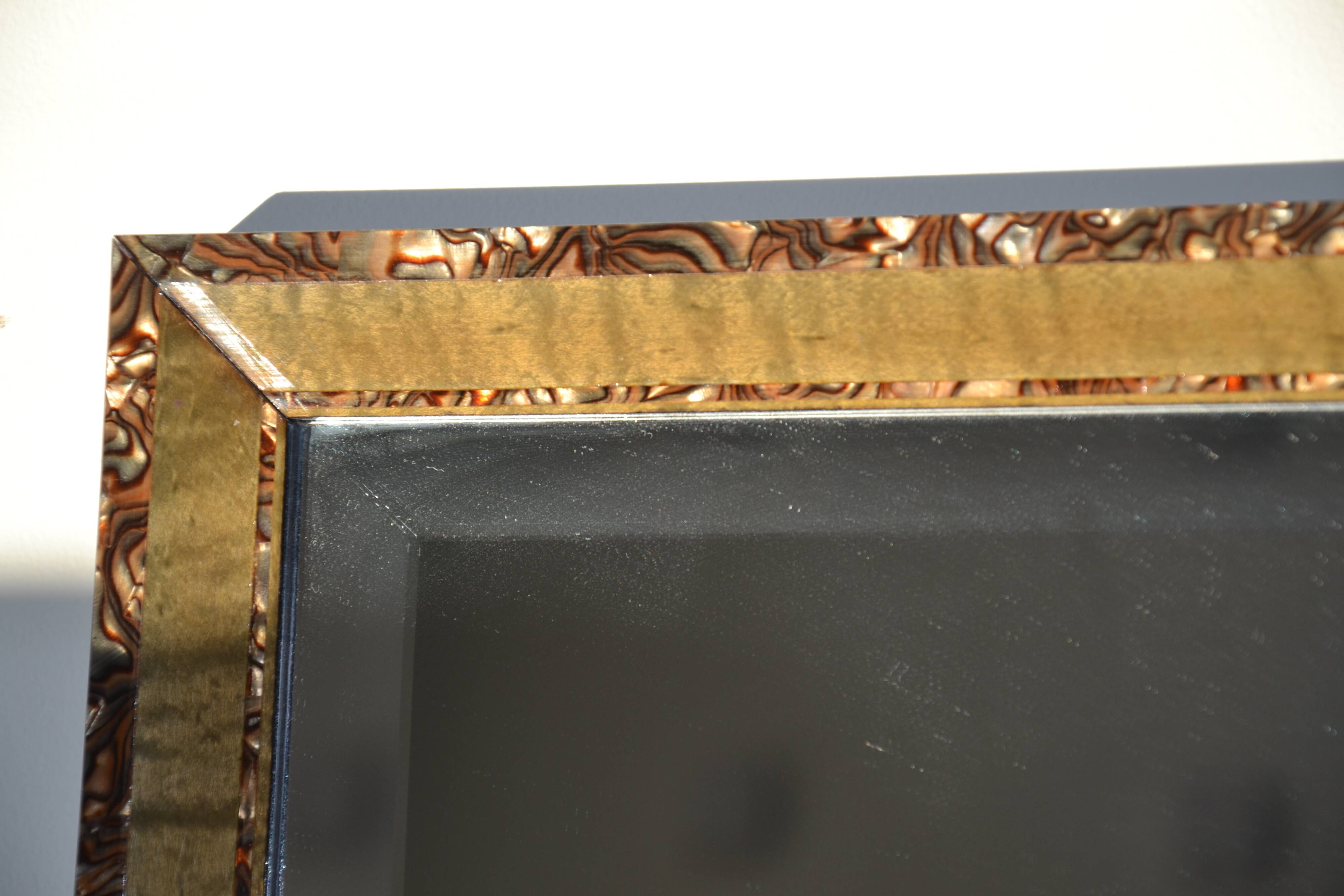 Large bevelled khaki mirror in mother-of-pearl from the 70s/80s.