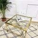 Table basse laiton plateau verre