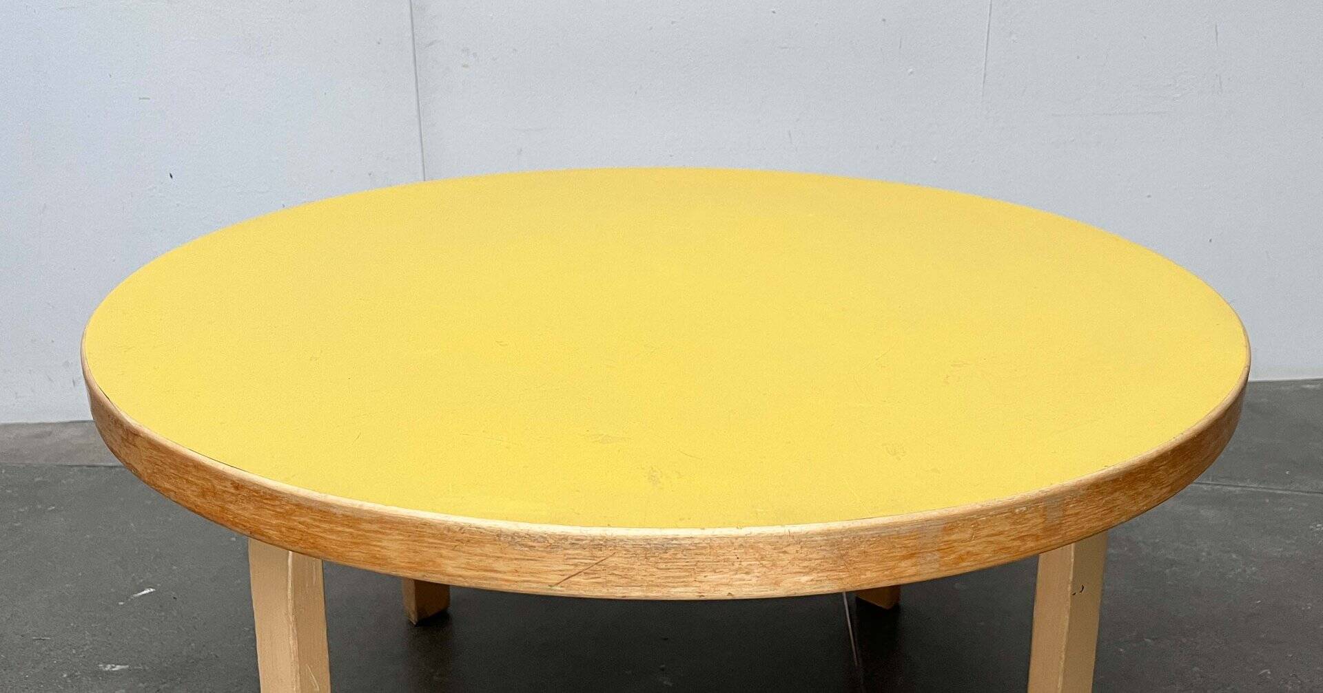 Mid-century modern yellow linoleum coffee table by Alva Aalto for Artek, Finland, 1960s.