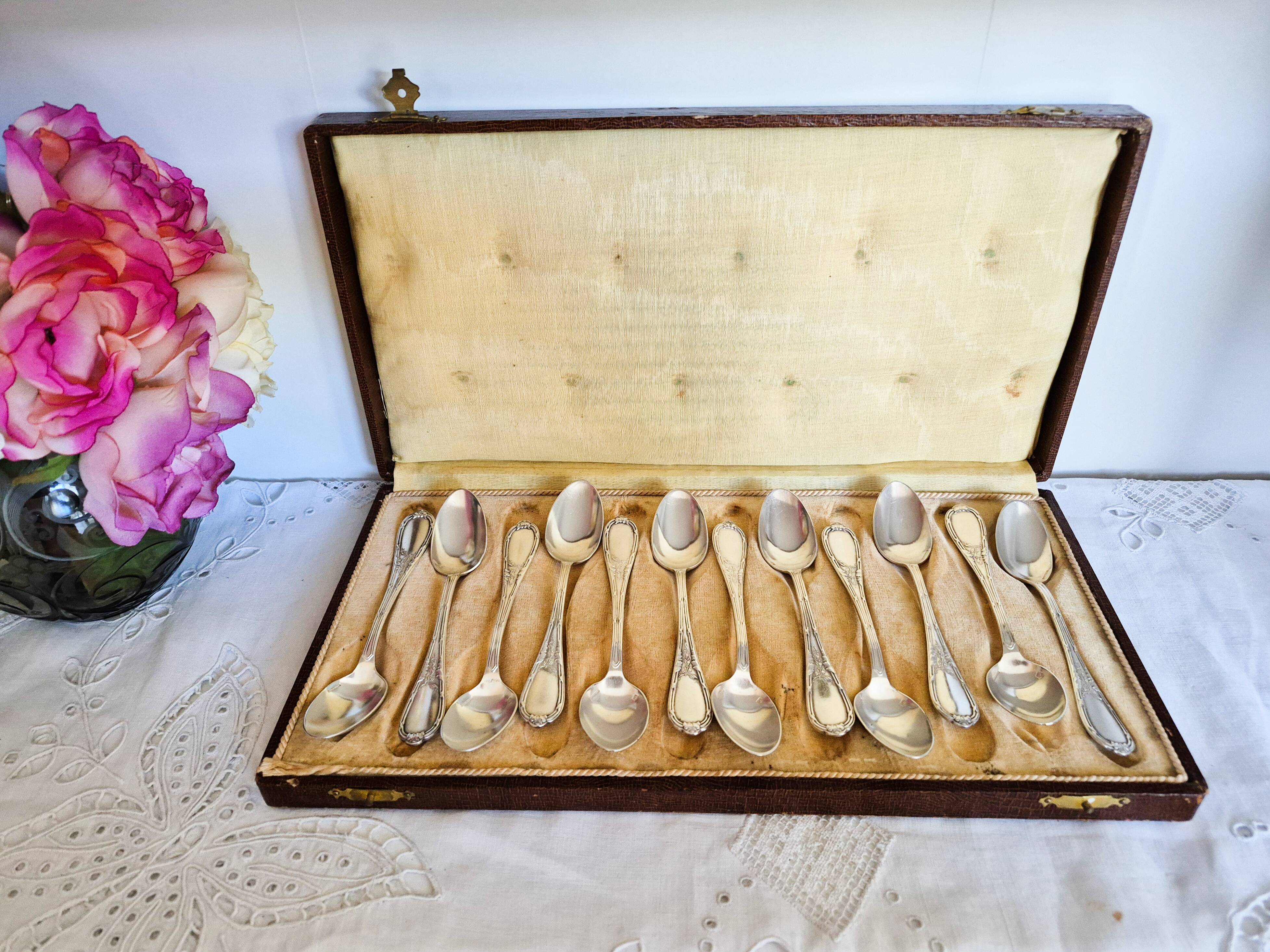 Dessert spoons, silver teaspoons, "white metal"