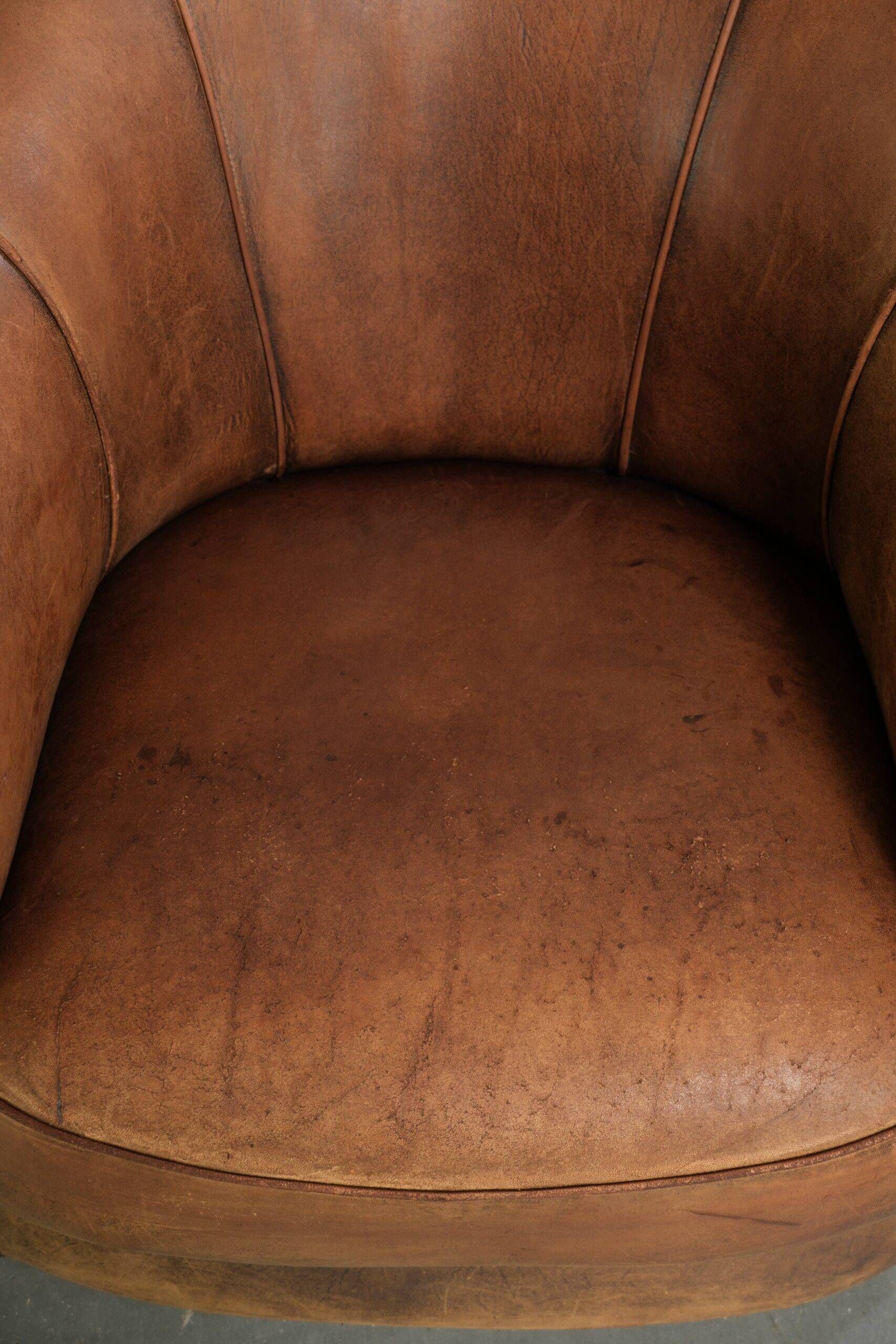 Sturdy set of vintage sheepskin club armchairs with a great appearance