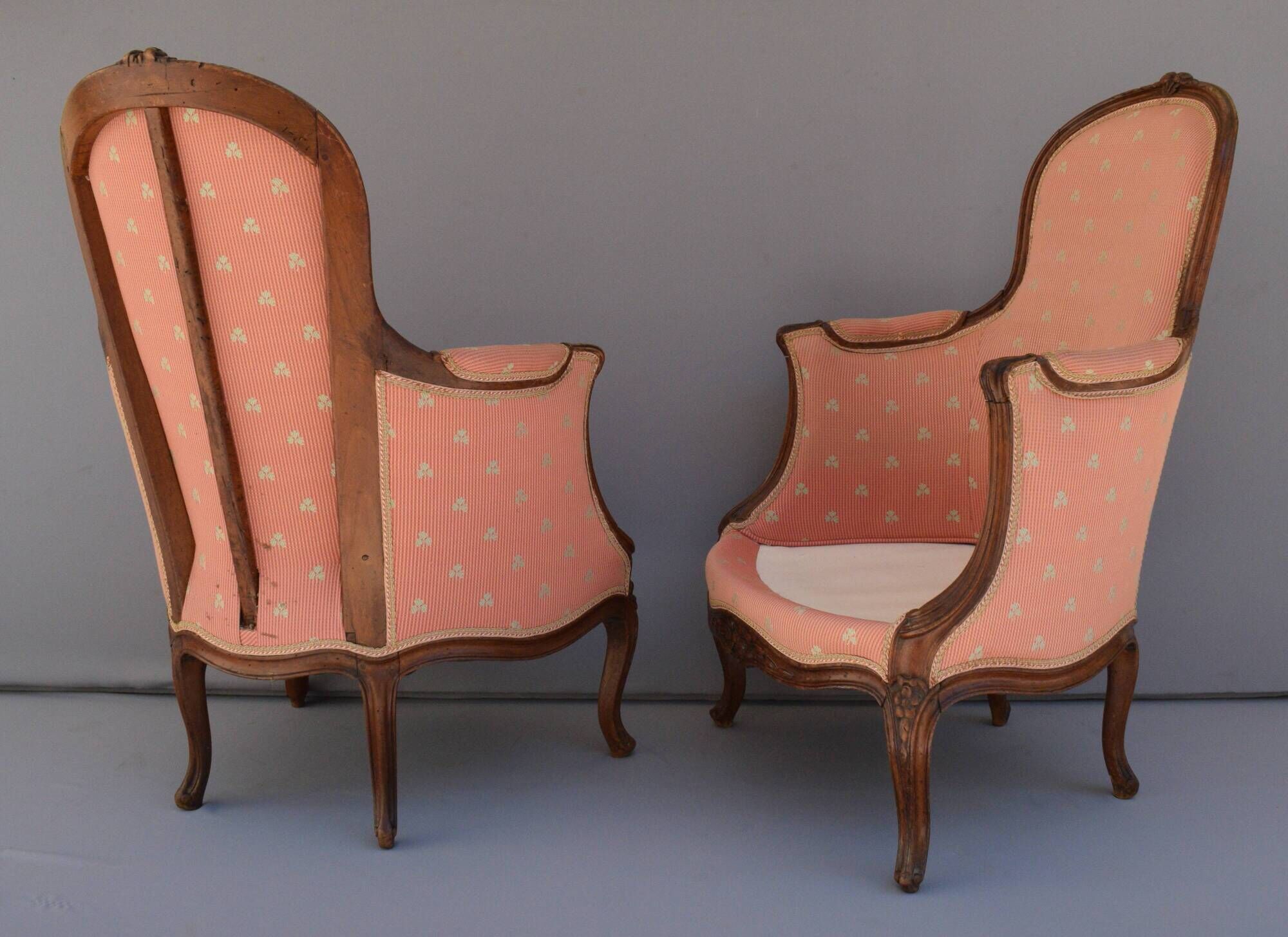 Pair of Louis XV period bergeres in walnut