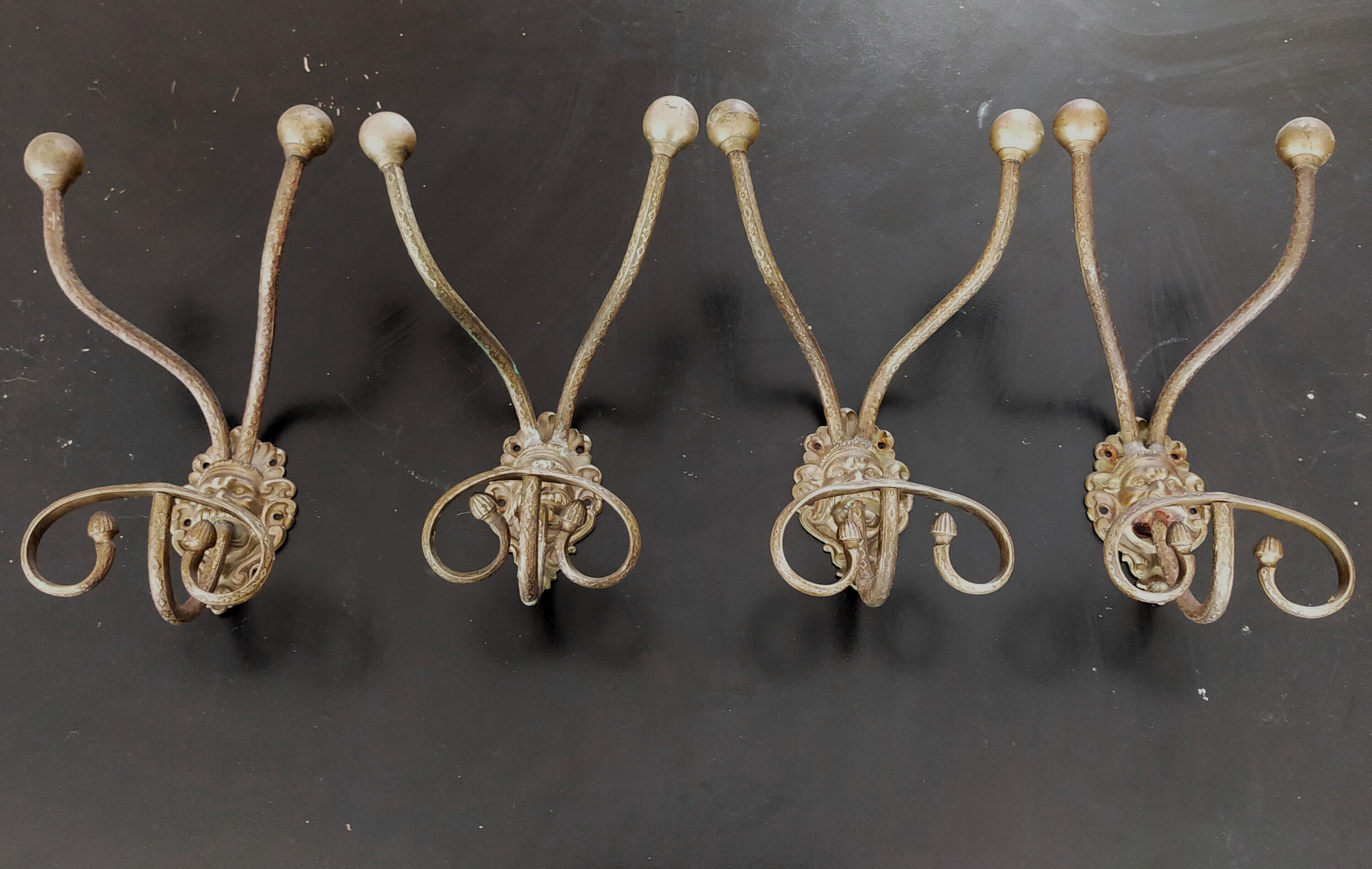 Set of 4 bronze mascaron hooks