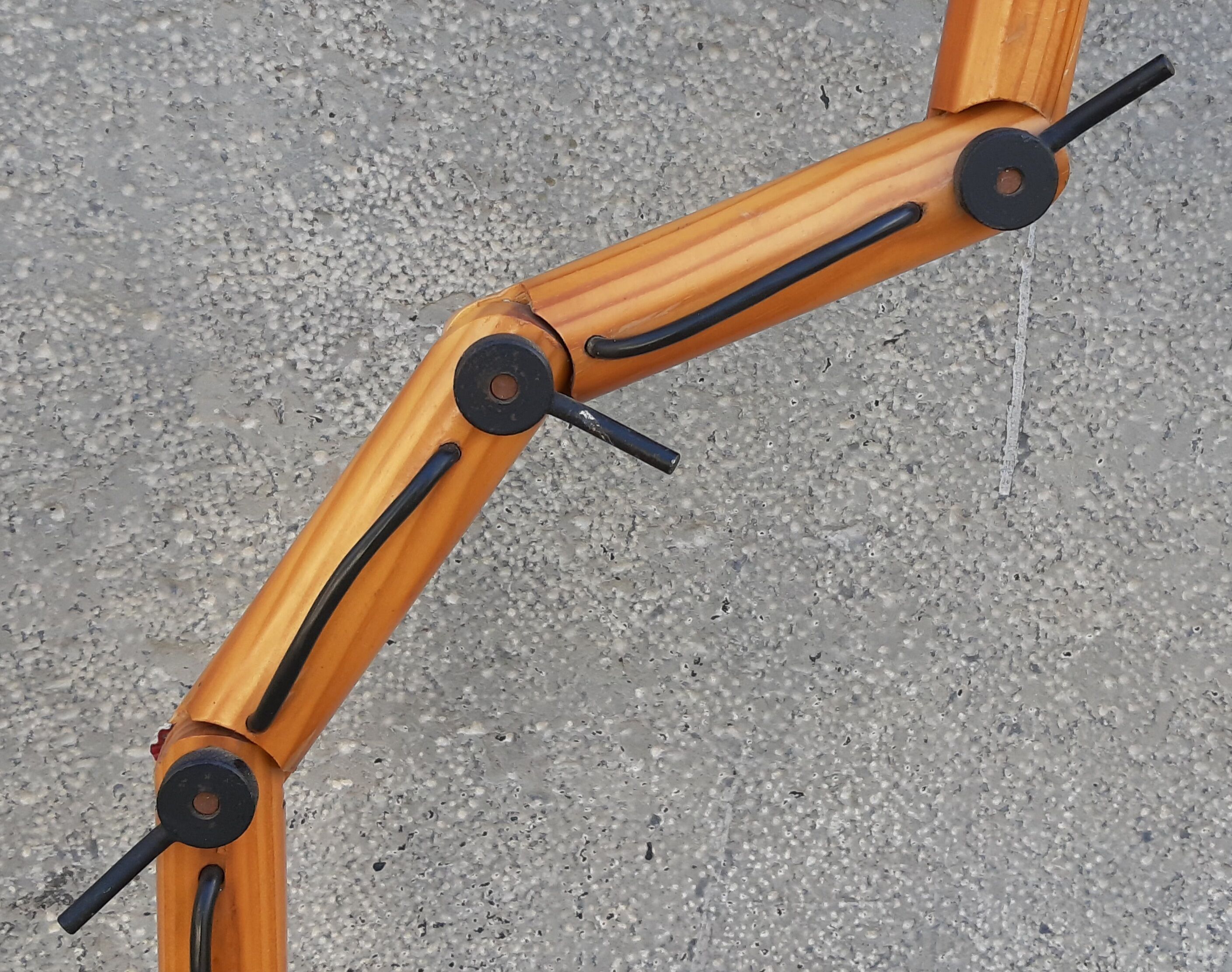 Articulated wooden lamp