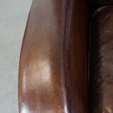 Sheep leather armchair with round shapes