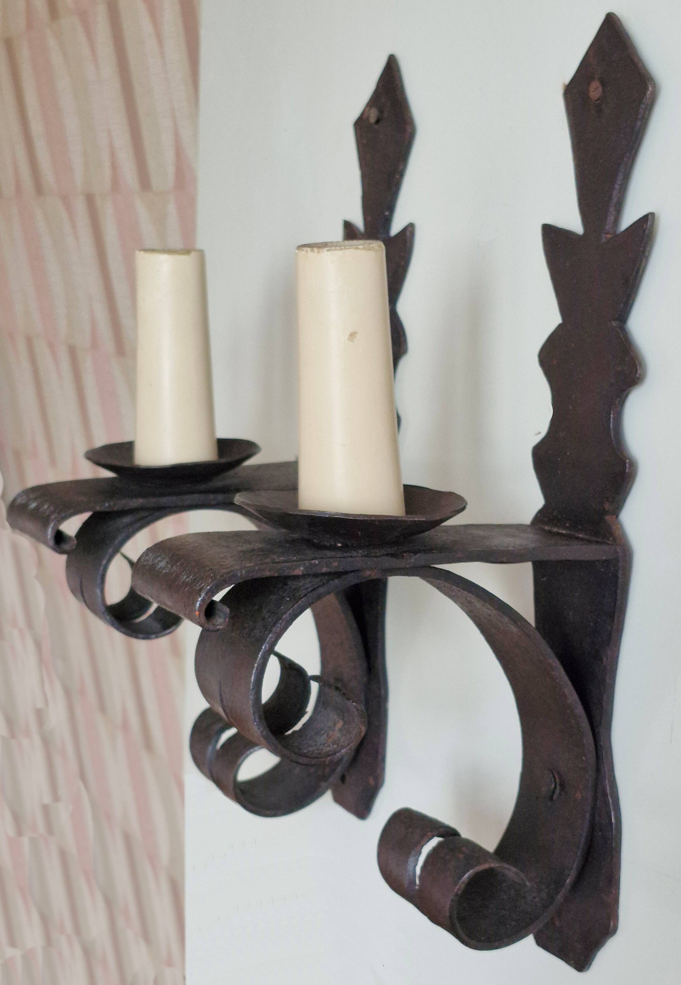 Duo of wrought iron wall lights Ateliers Marolles