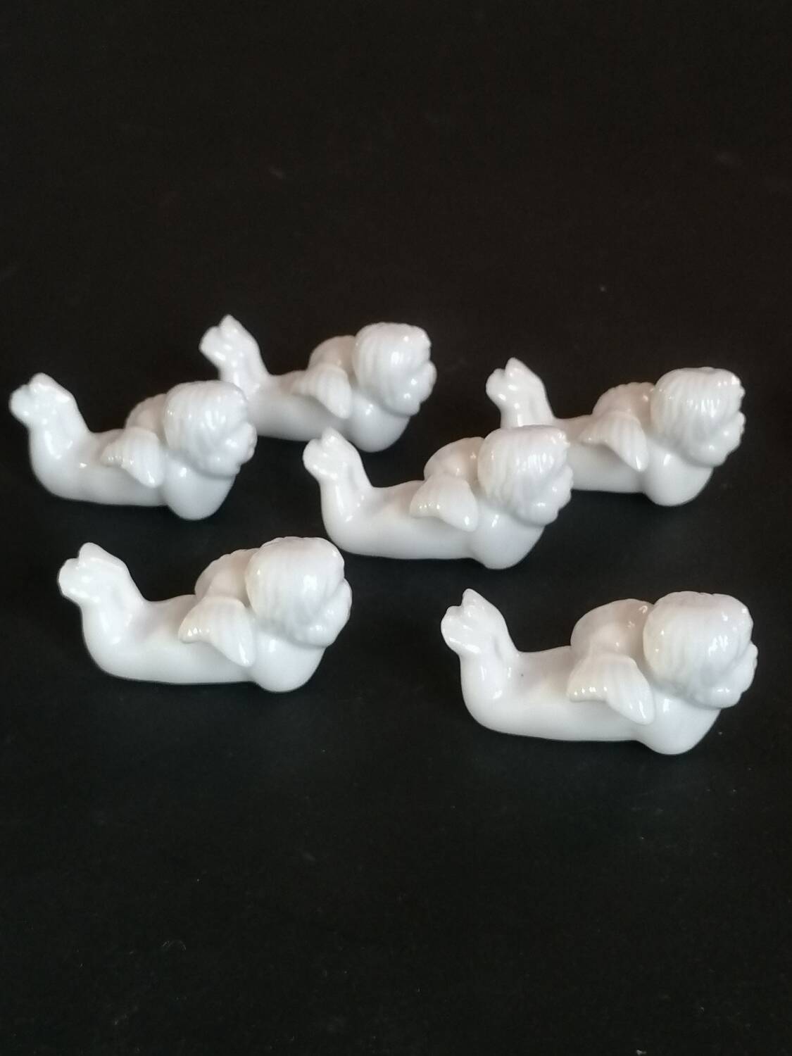 Lot 6 knife holders and 6 porcelain place markers putti angels