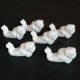 Lot 6 knife holders and 6 porcelain place markers putti angels