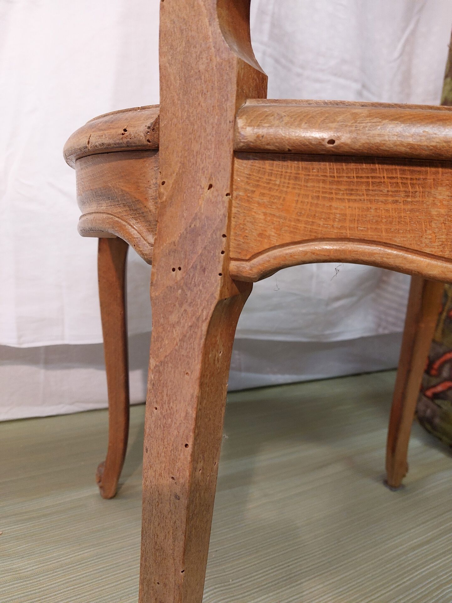 Caned chair in Louis XV style painted orange.