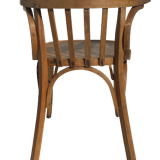 Curved wooden armchair