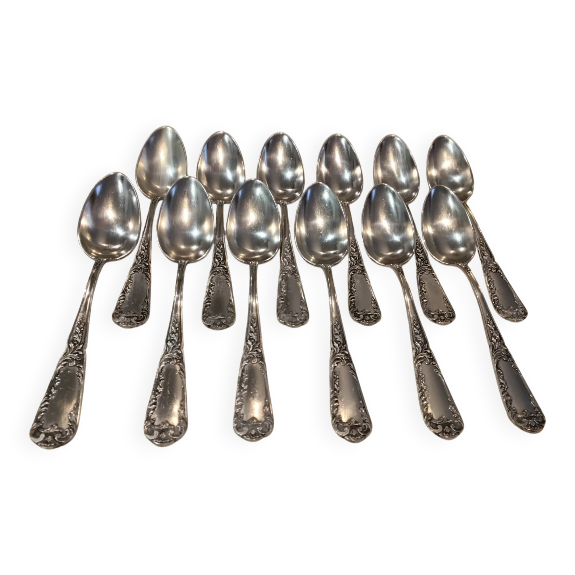 12 silver-plated metal dessert spoons, silversmith SFAM, rocaille design, 19.1 cm.