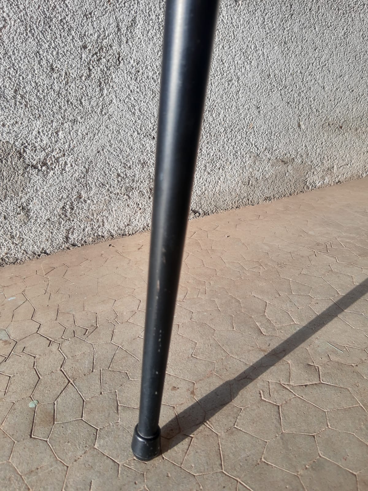 Tripod stool with vintage red moumoute seat