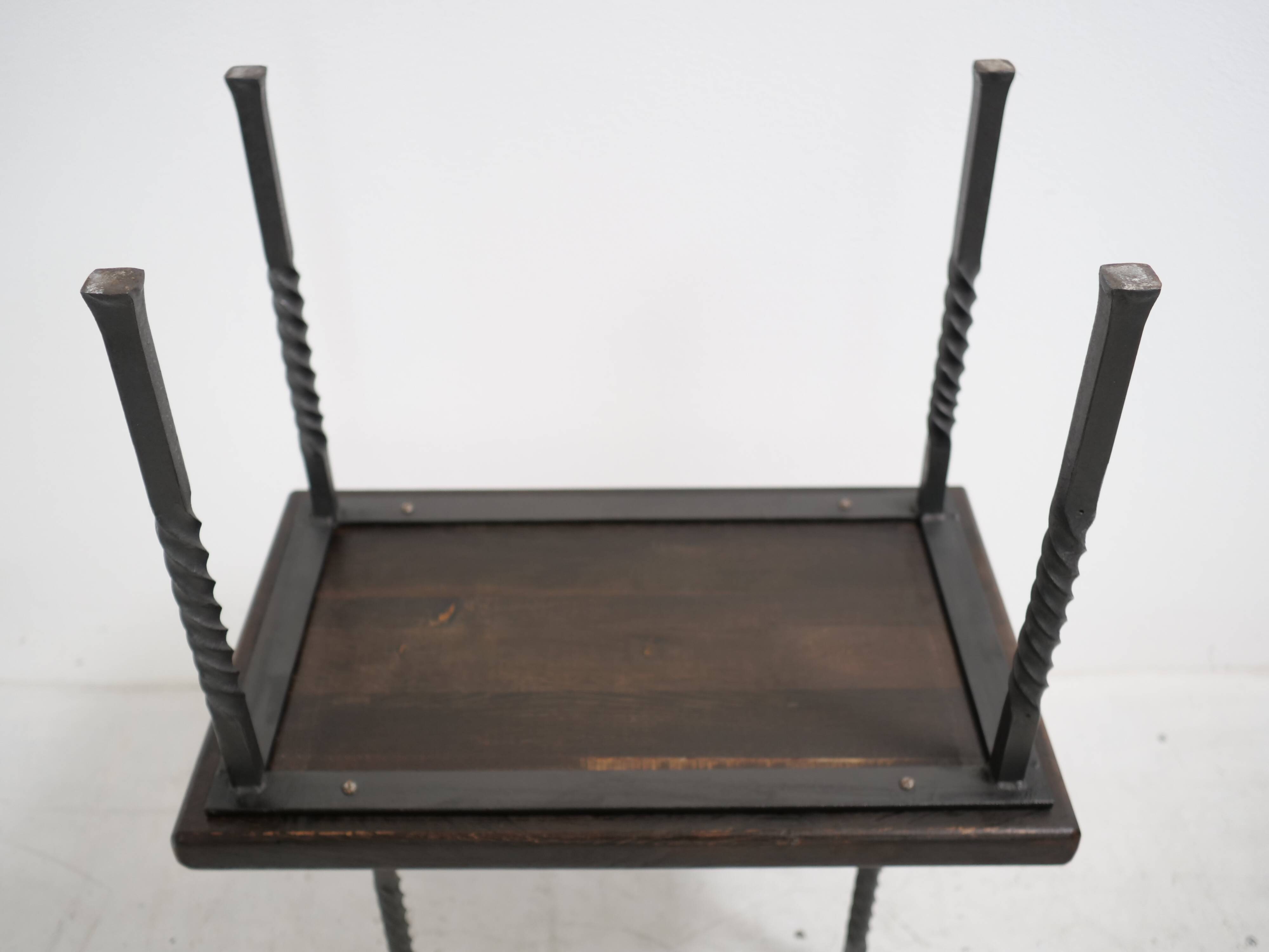 Brutalist nesting table in ebonized oak and wrought iron