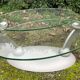 Design coffee table Naos in tempered glass and cast iron.