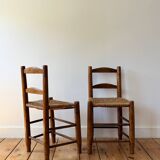 Brutalist chairs made of wood and straw