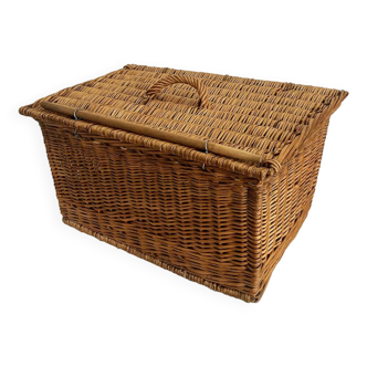 Old wicker basket with closure and handle
