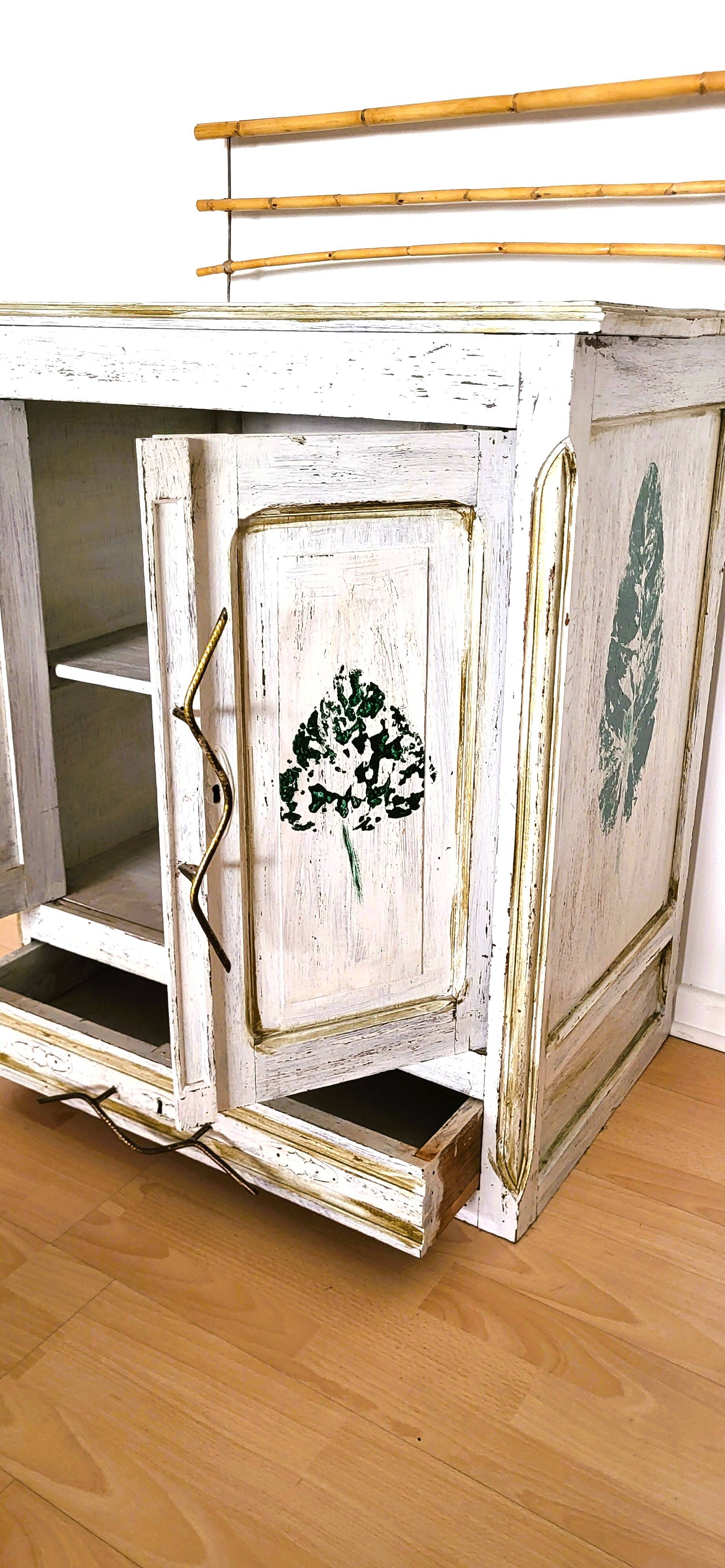 Elegant small patinated sideboard