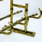 Bamboo-like coat rack in bronze