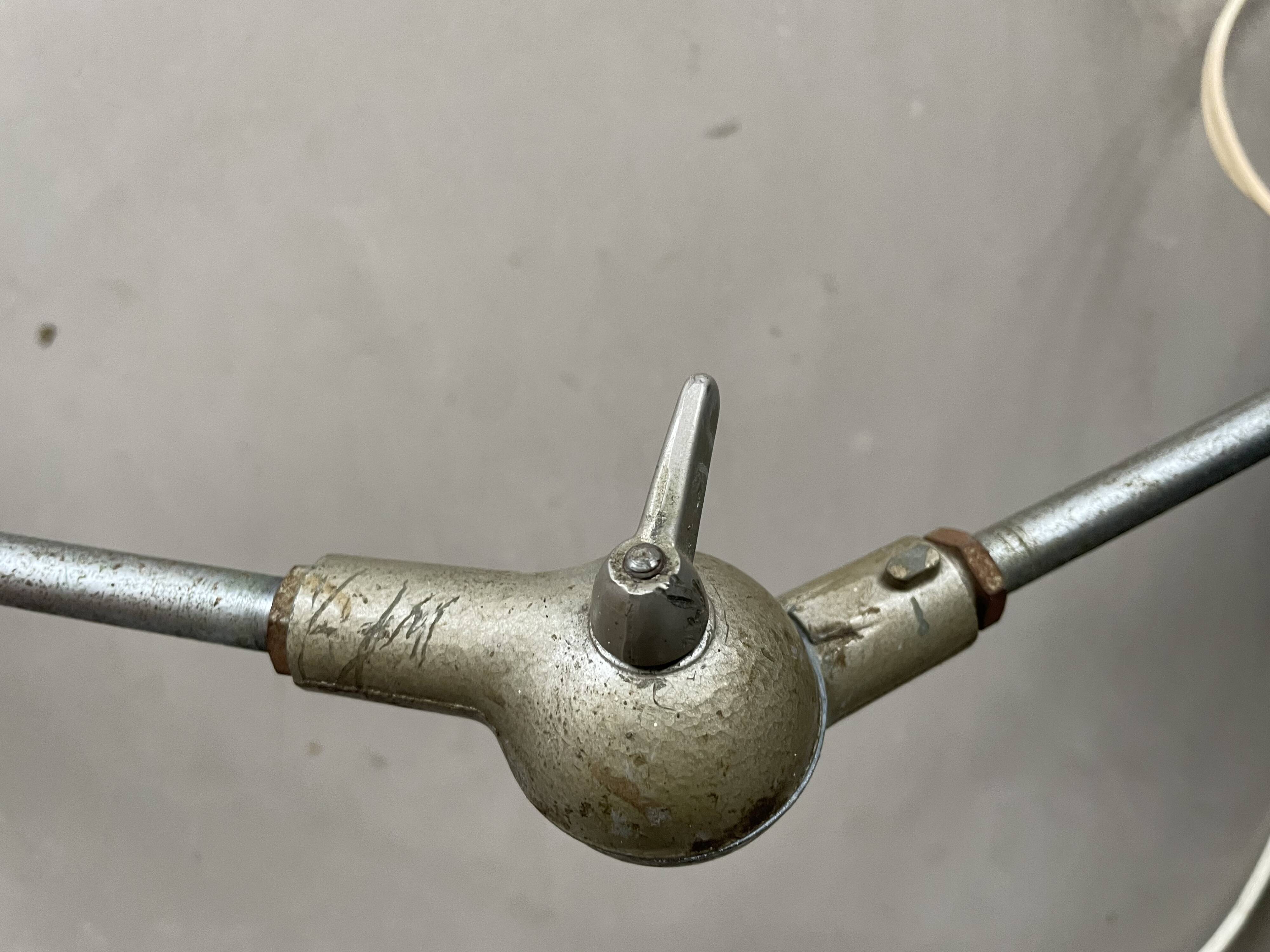 Old industrial articulated lamp