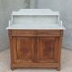 Antique walnut and white marble bathroom cabinet