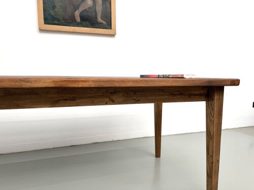 Oak dining table with tapered legs, 1970s.