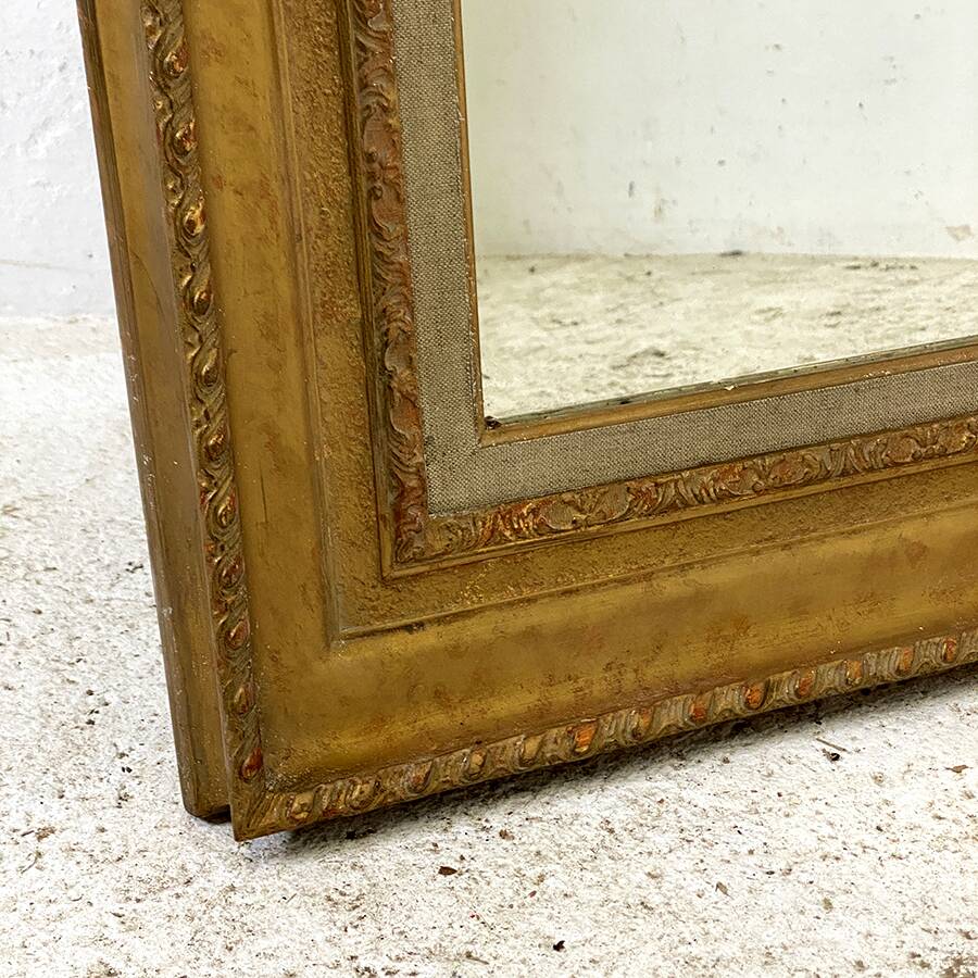 Louis XVI style wood and gilded stucco mirror