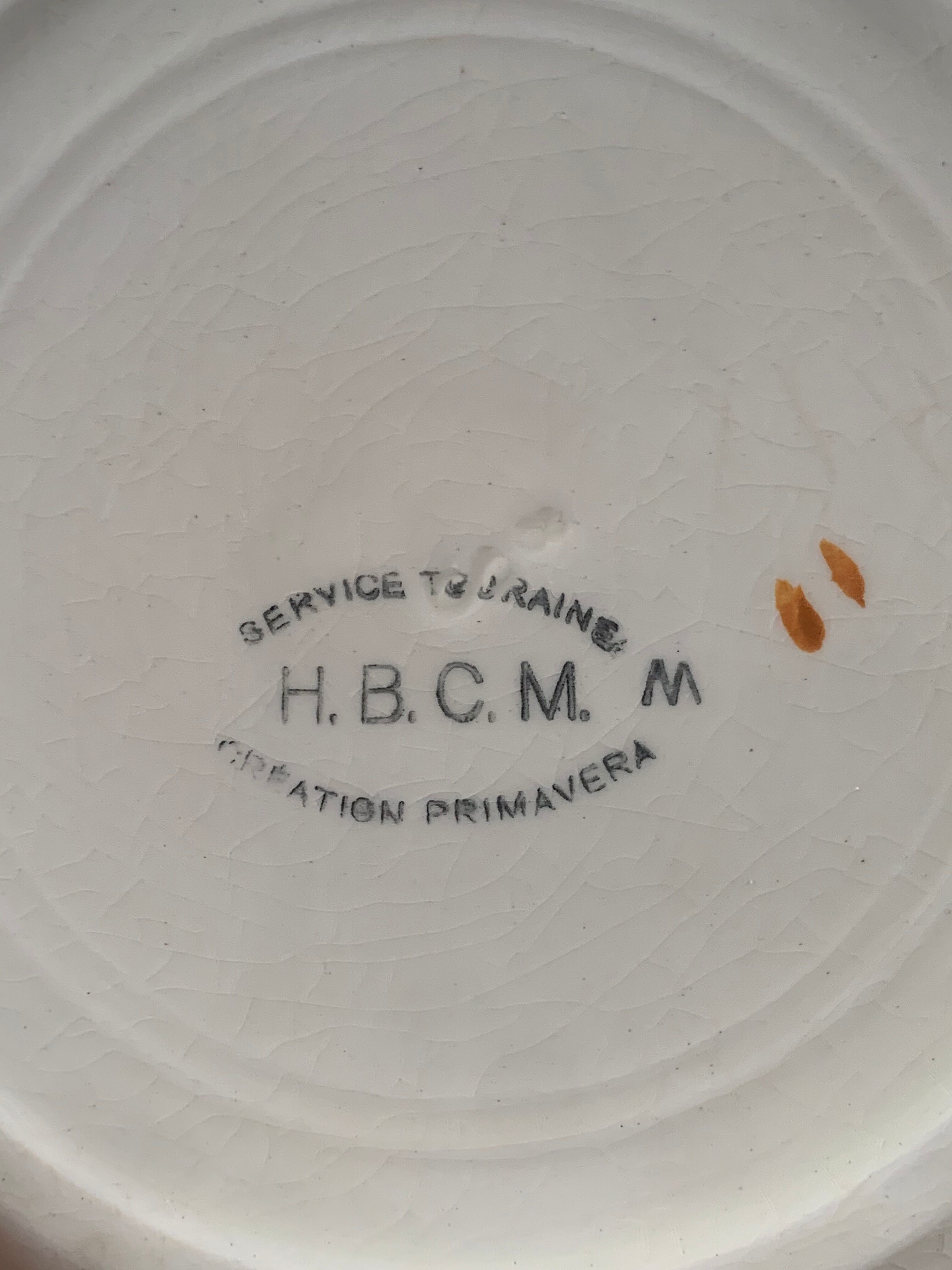 15 orange Primavera plates