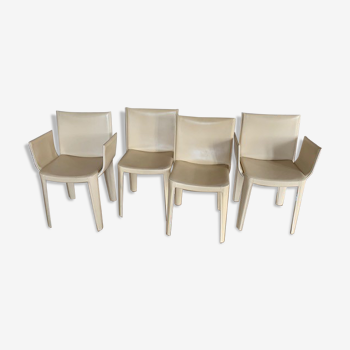 2 fauteuils et 2 chaises de marque Quia en cuir beige
