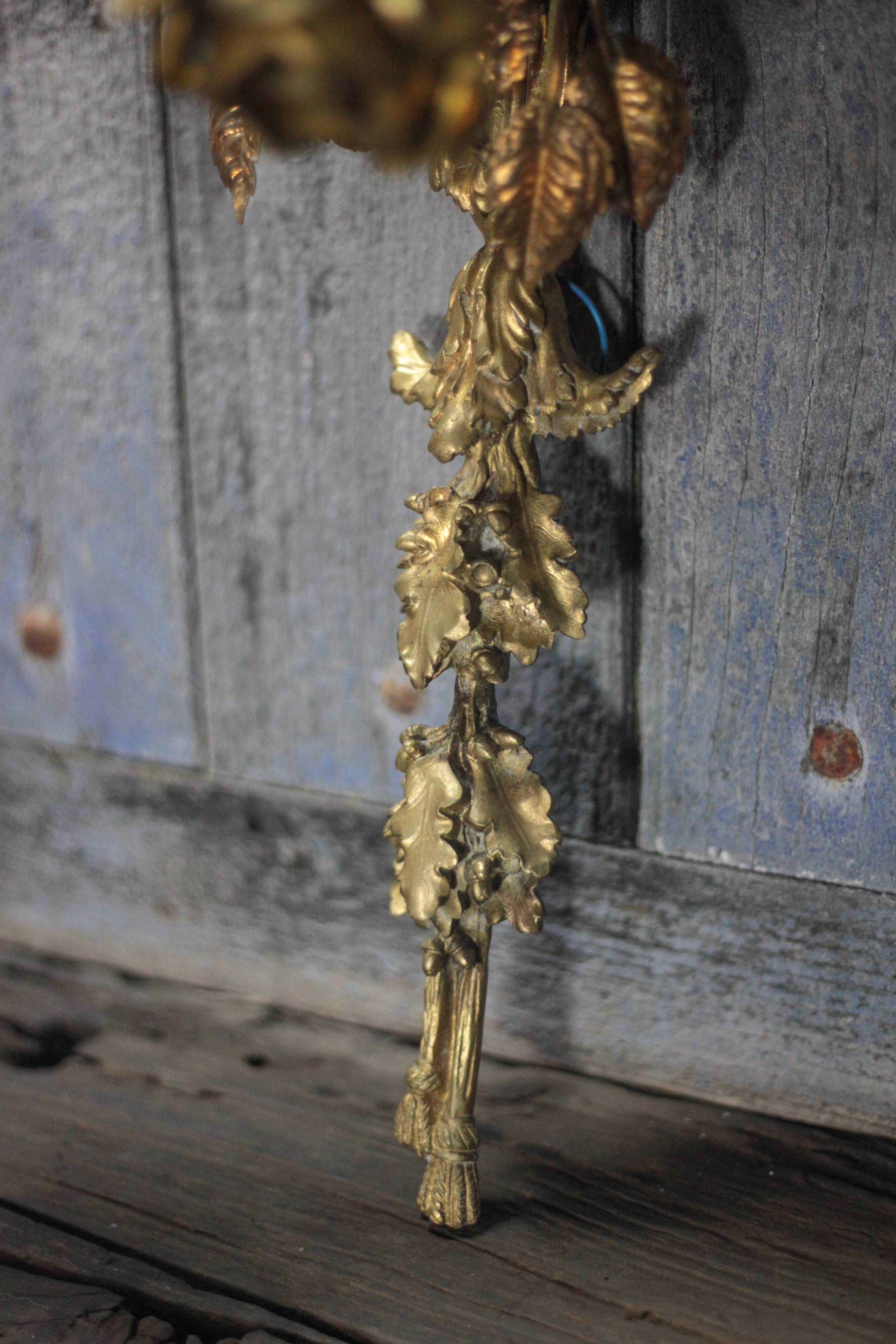 Pair of bronze and gold metal floral wall sconces, flower wall lamp.