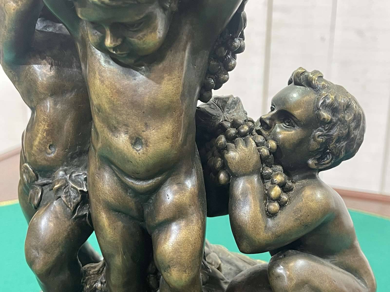 Bronze piece depicting 3 cherubs signed J. DASTE - 1950s