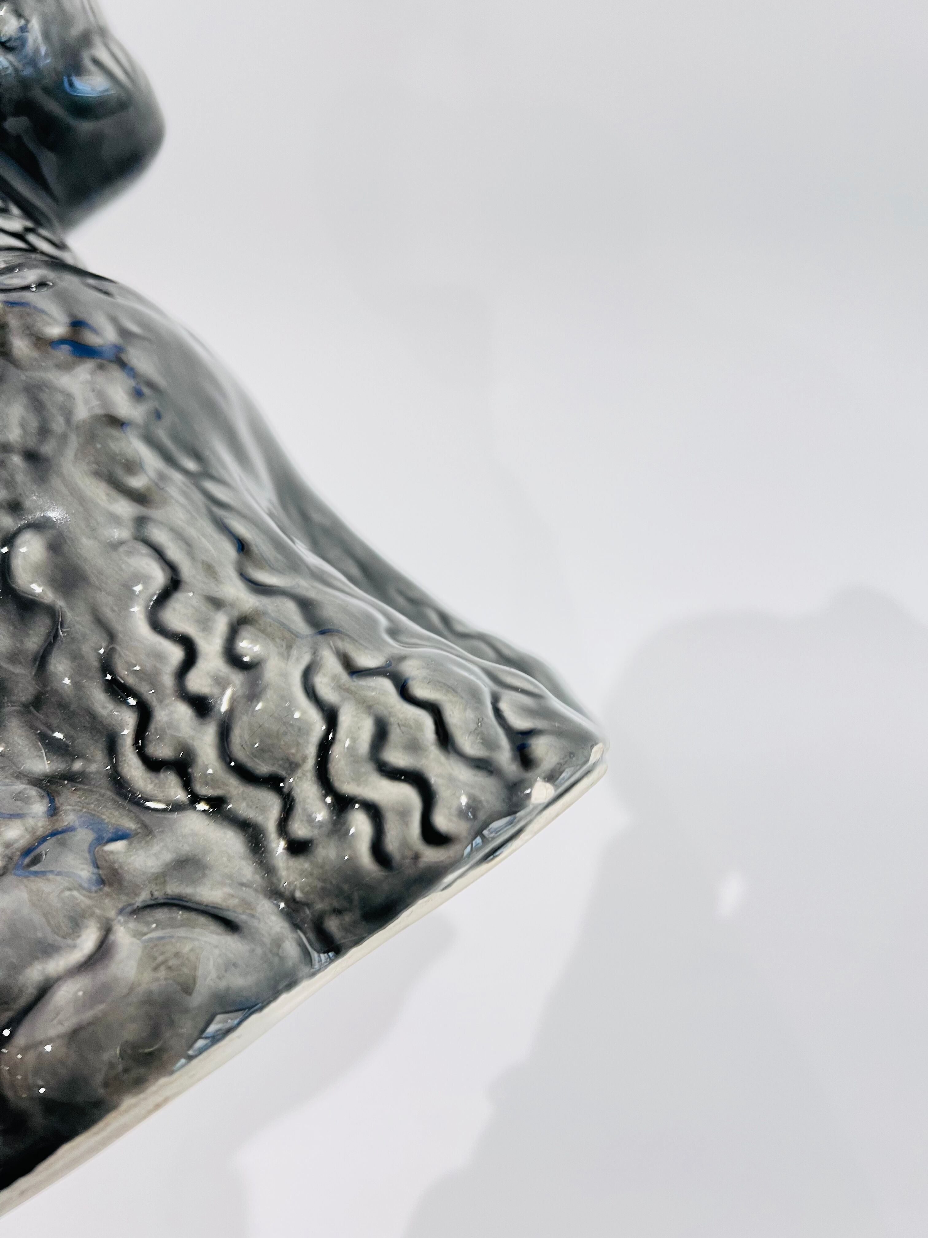 Pitcher in grey poodle slip