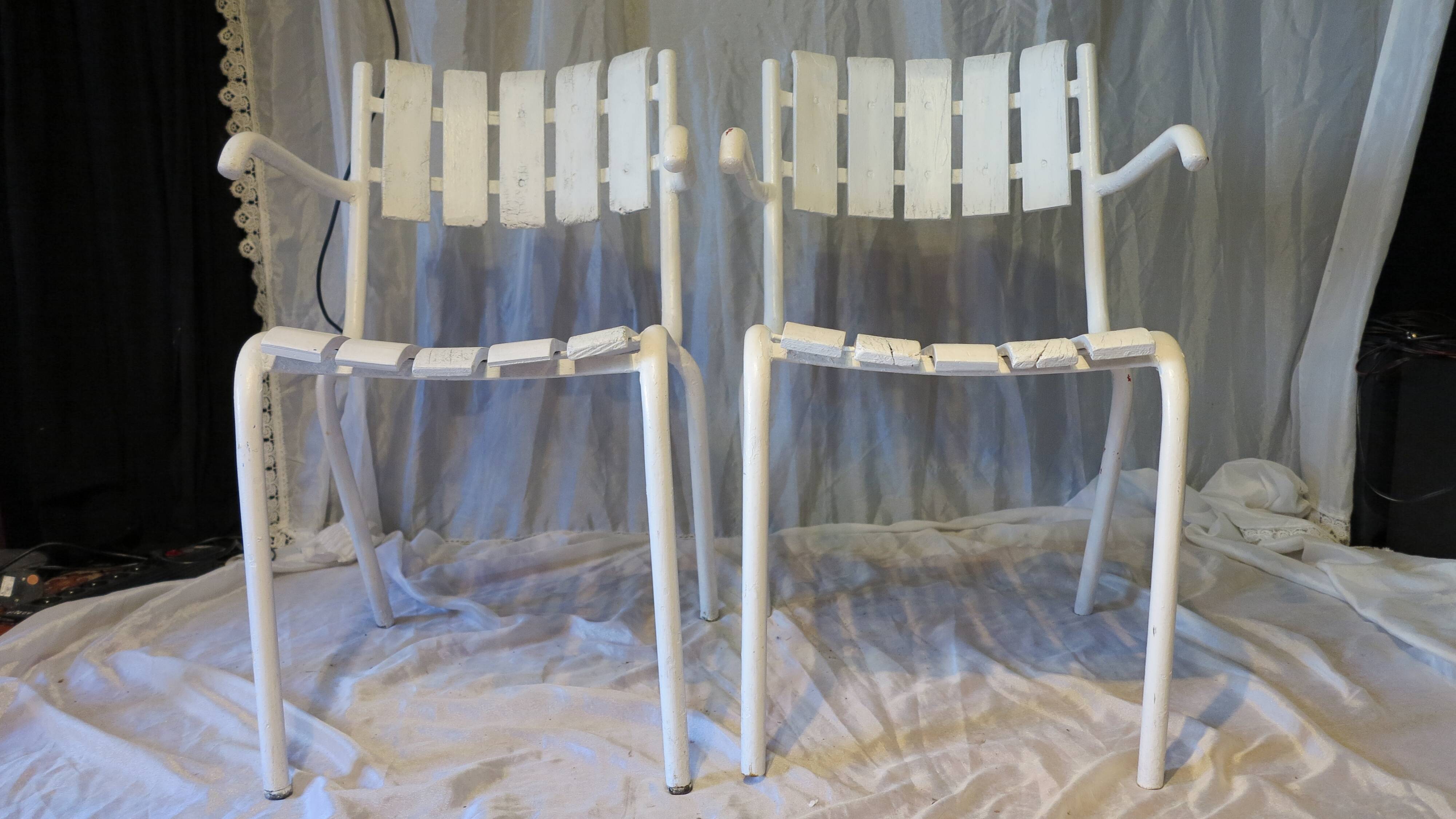 Pair of white garden armchairs