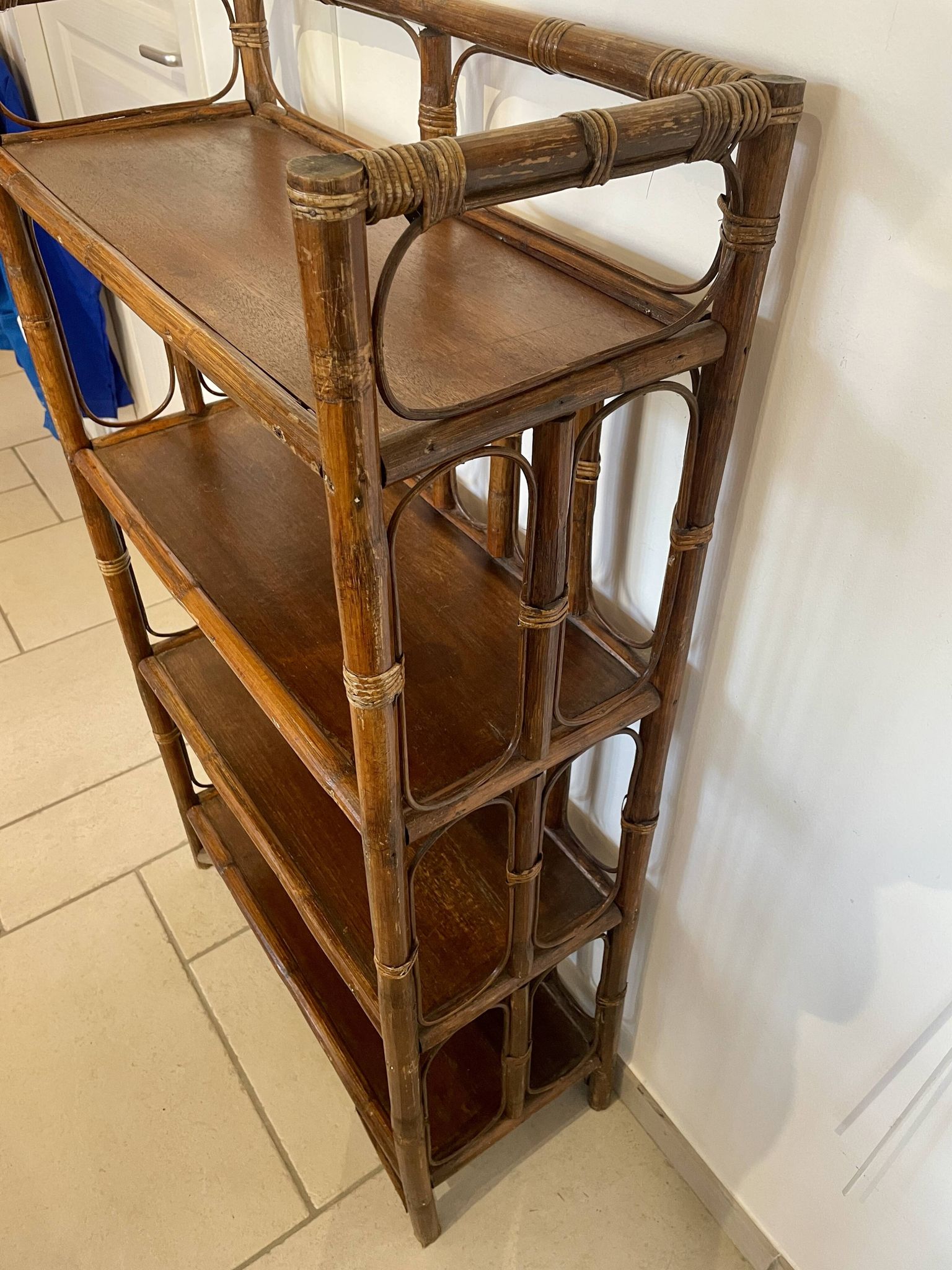 Shelf on rattan and bamboo legs from the 70s