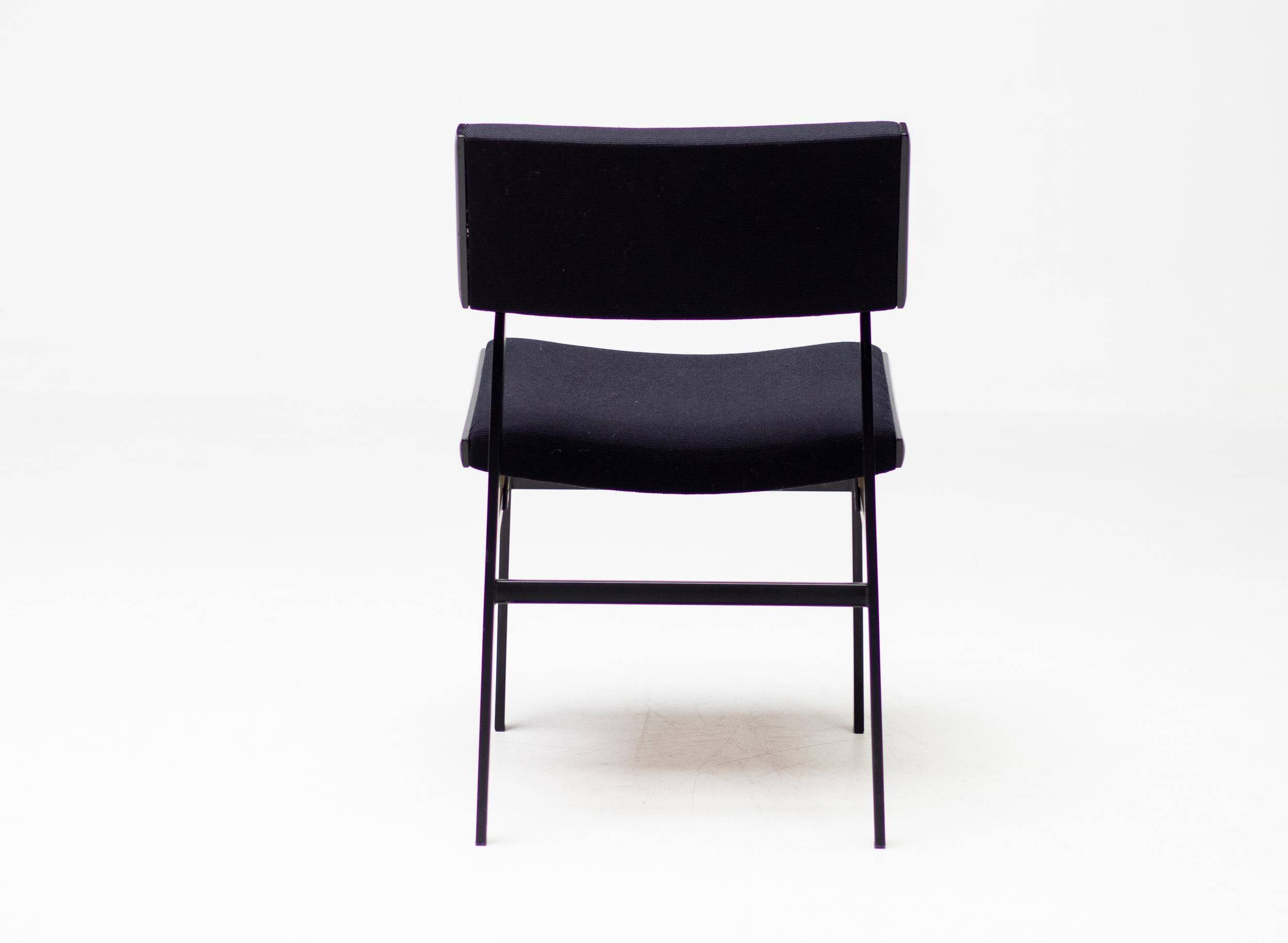 Set of four entirely black Hulmefa dining chairs, Architectural Modernism.