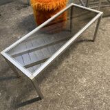 Set of coffee tables, pedestal tables and nesting tables in smoked glass and metal