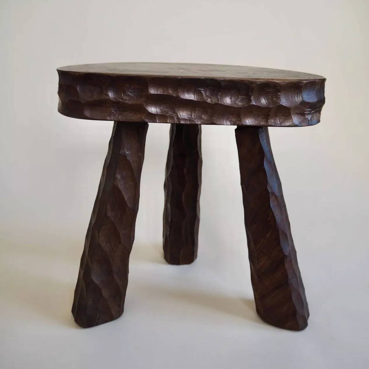 Pair of wooden tripod stools