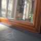 Large rectangular antique wall mirror in vintage wood, 1930