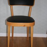 5 baumann chairs with large backs in black faux leather.