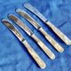 4 antique butter spreading knives in silver-plated metal and mother-of-pearl.