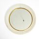 Mid Century Modern round wall mirror with a white expanded metal frame