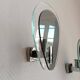 Pair of space age wall lights with smoked glass from the 1970s.