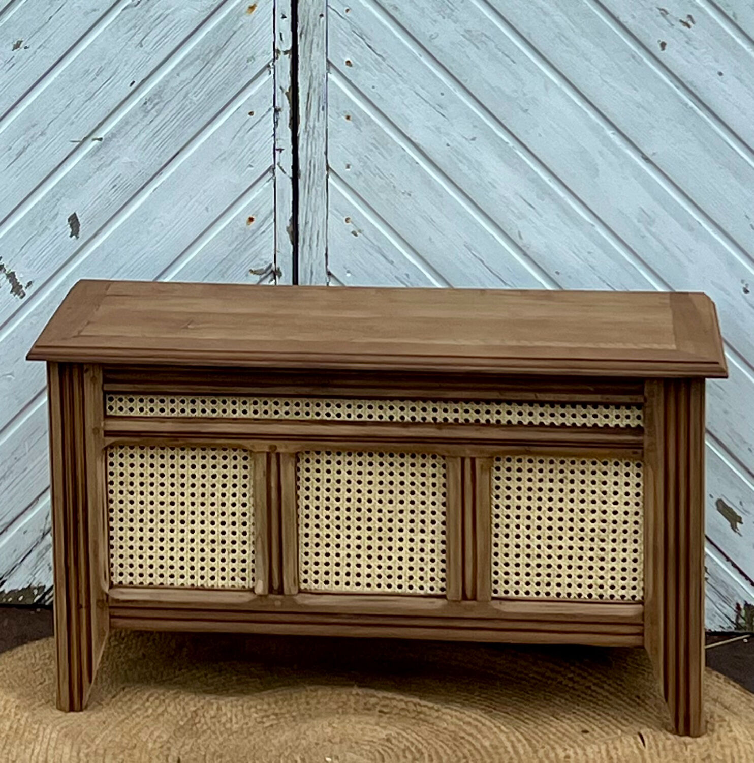 Antique oak chest with raw wood and cane work.