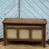 Antique oak chest with raw wood and cane work.