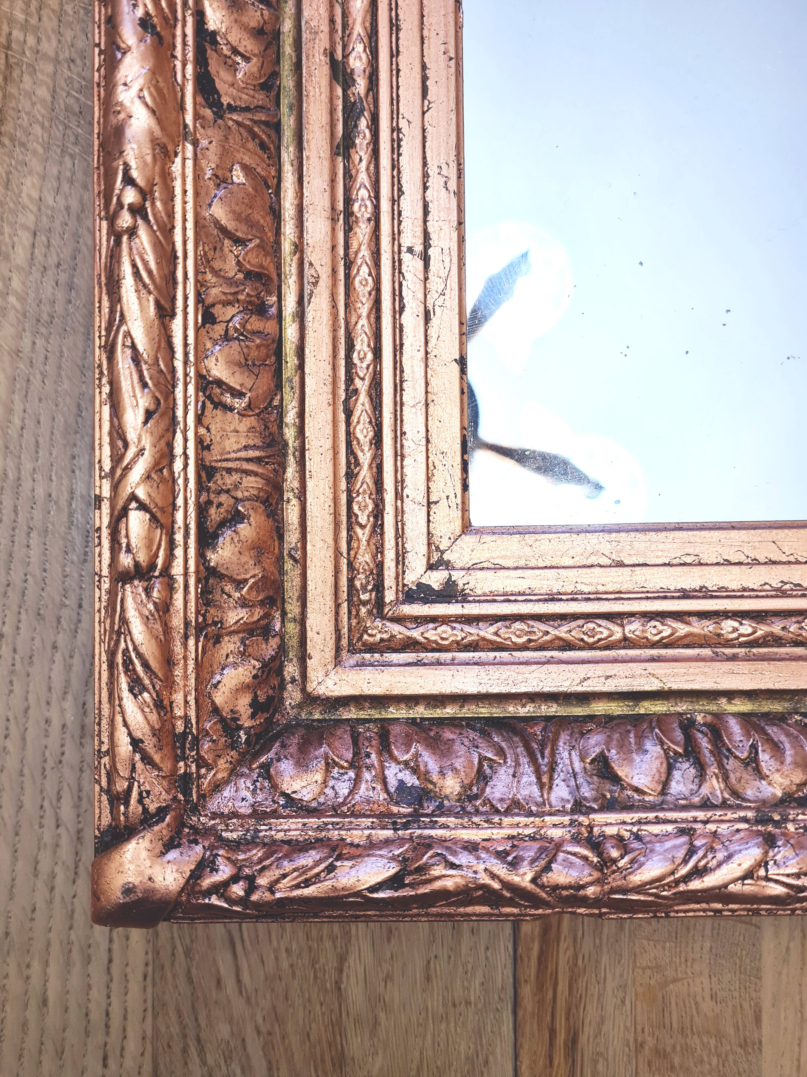 Napoleon III mirror, Wood and stucco, Gilded with copper leaf.