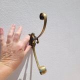 Pair of antique gilt bronze coat hooks