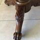 Wooden gueridon with marble, lion paw legs.