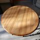 Old round table in walnut with flaps Louis Philippe