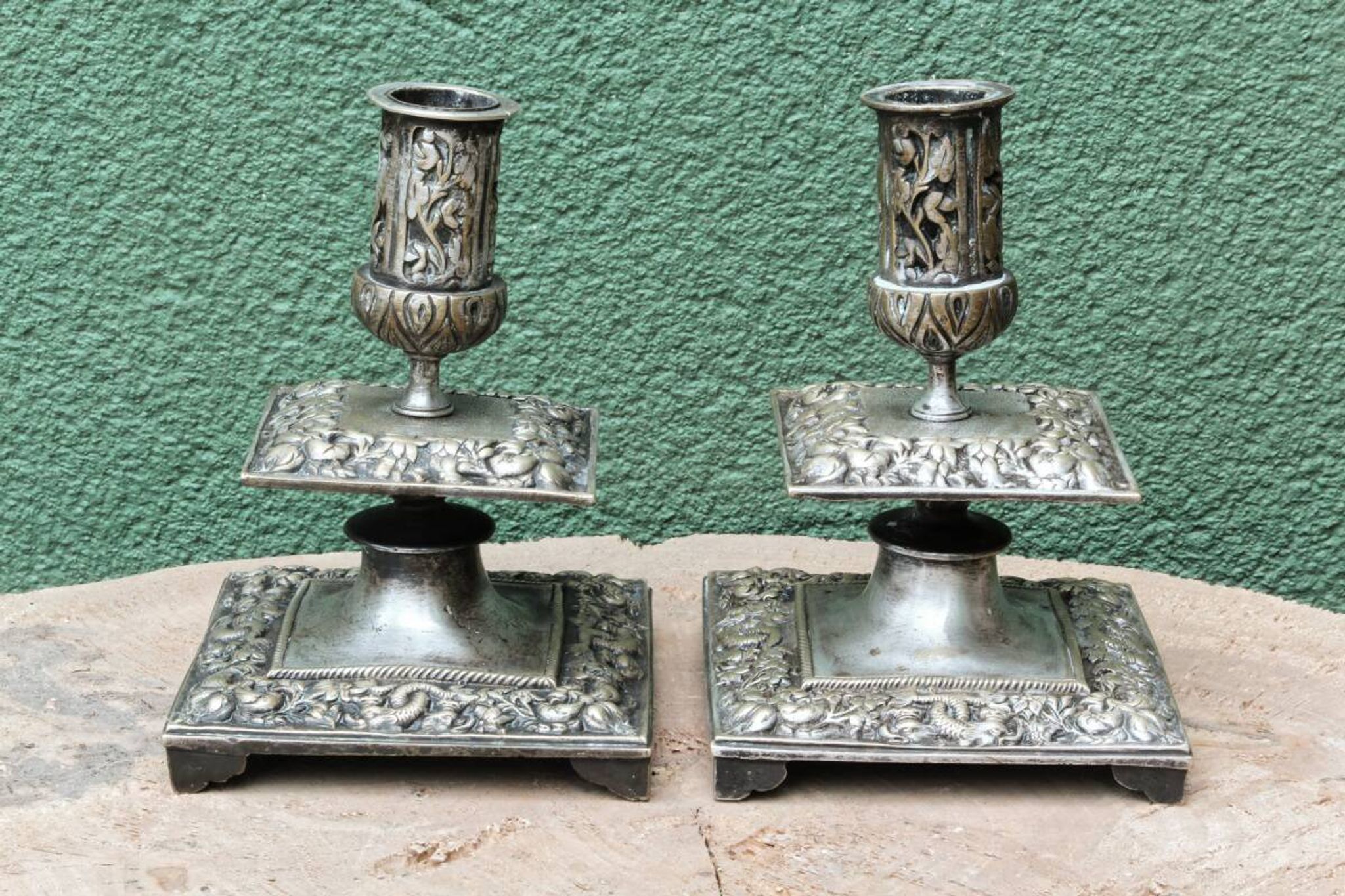 Pair of square candlesticks in patinated bronze
