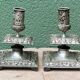 Pair of square candlesticks in patinated bronze